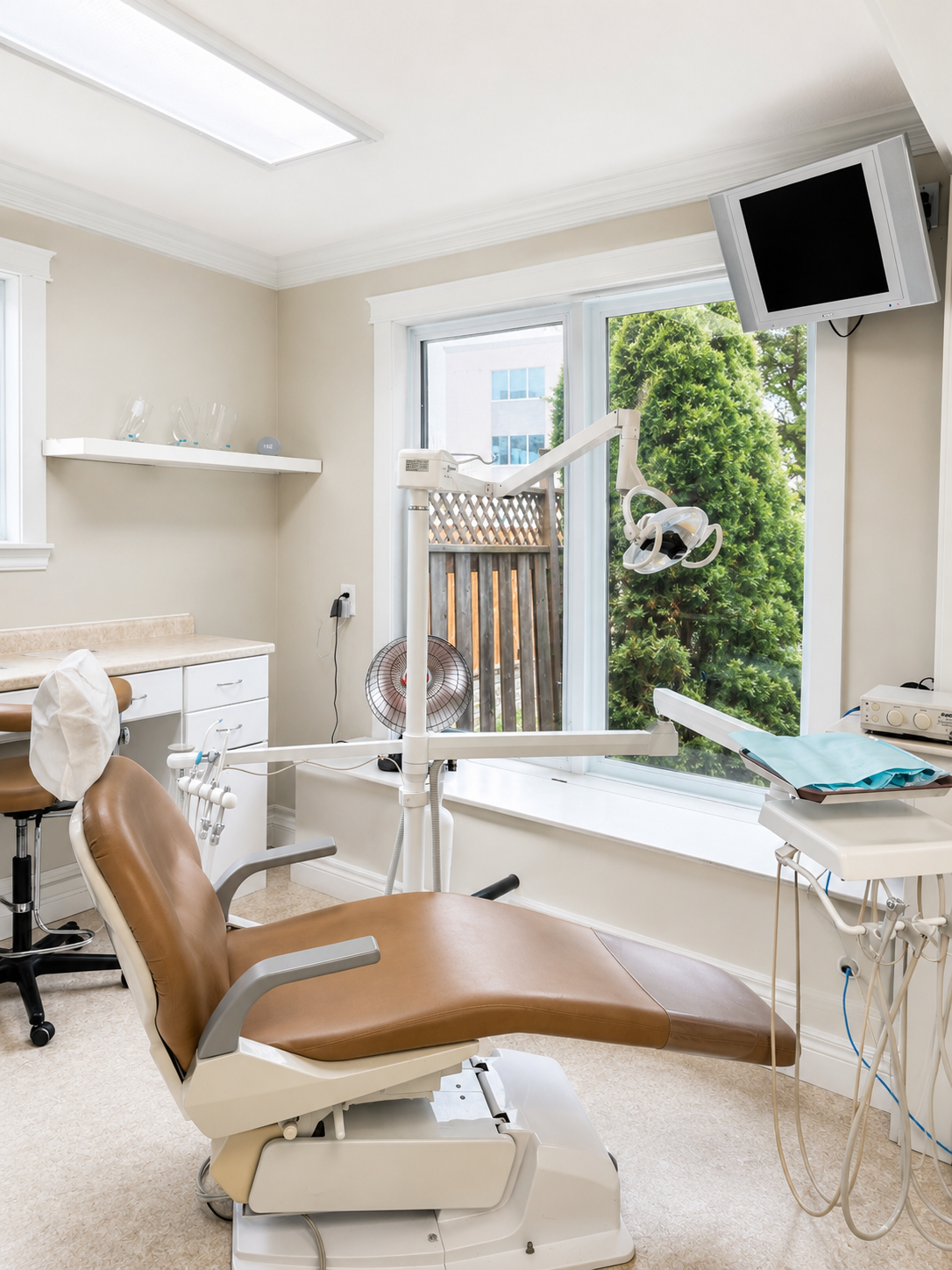 A modern dental operatory with advanced technology and soft purple accents